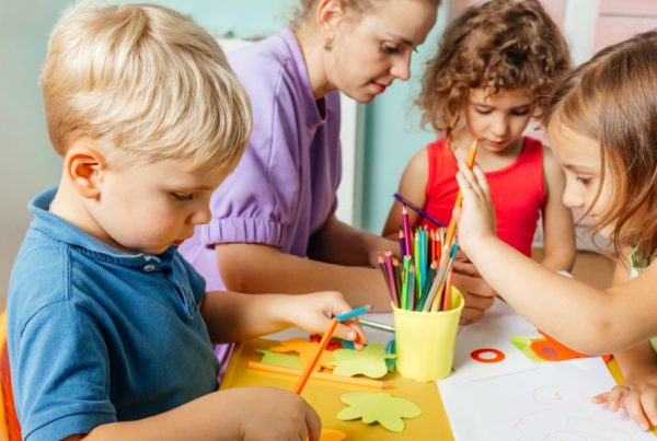 teacher with kids, doing art activities
